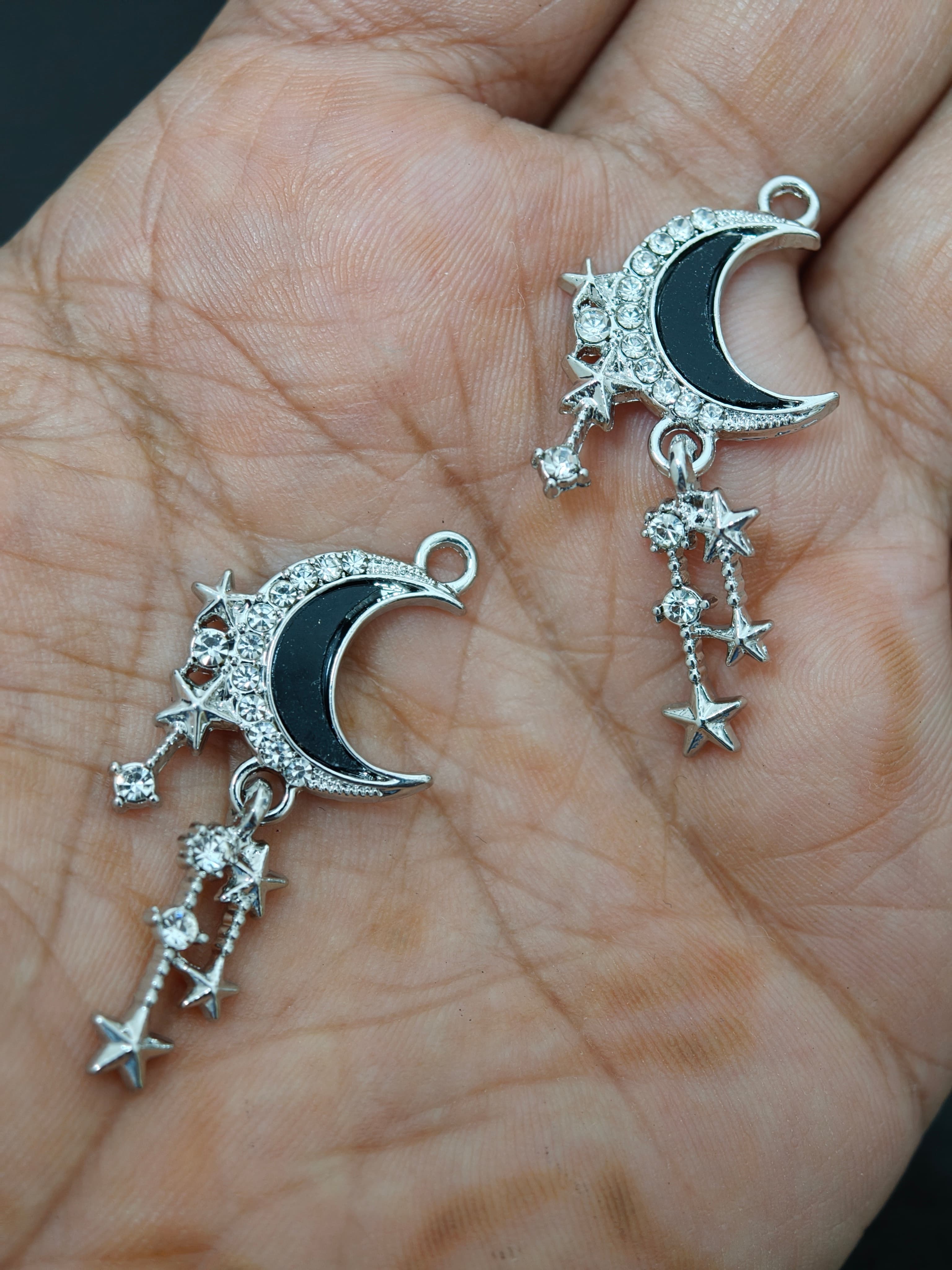 Moon with falling stars