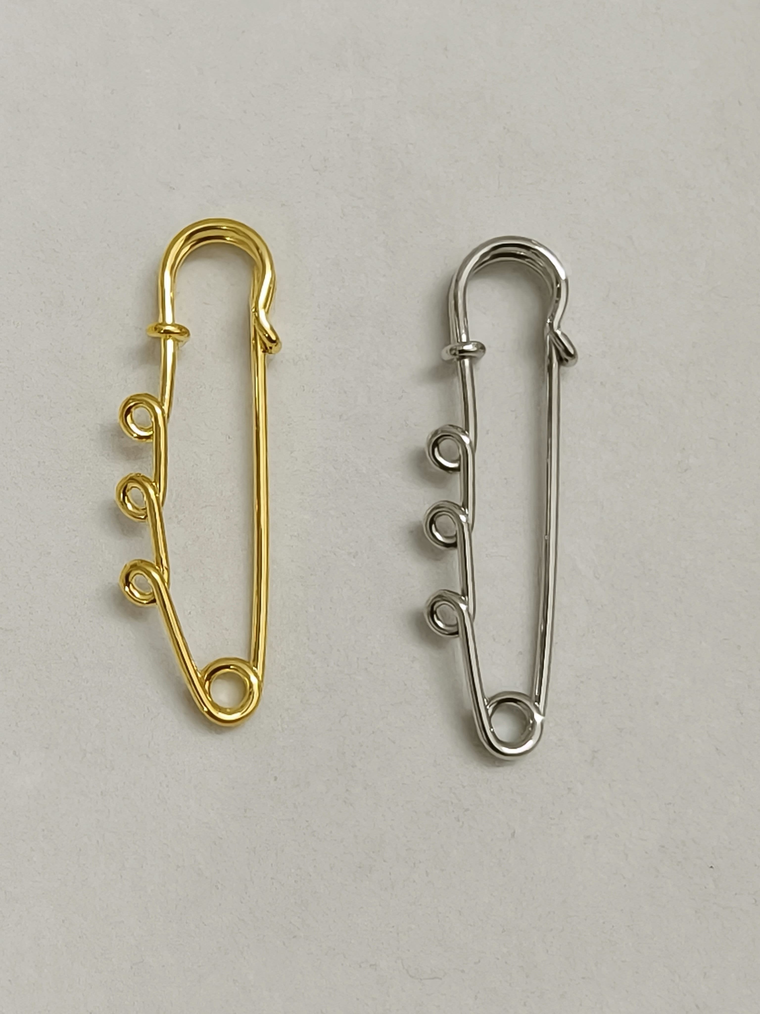 Safety pin with 3 loops