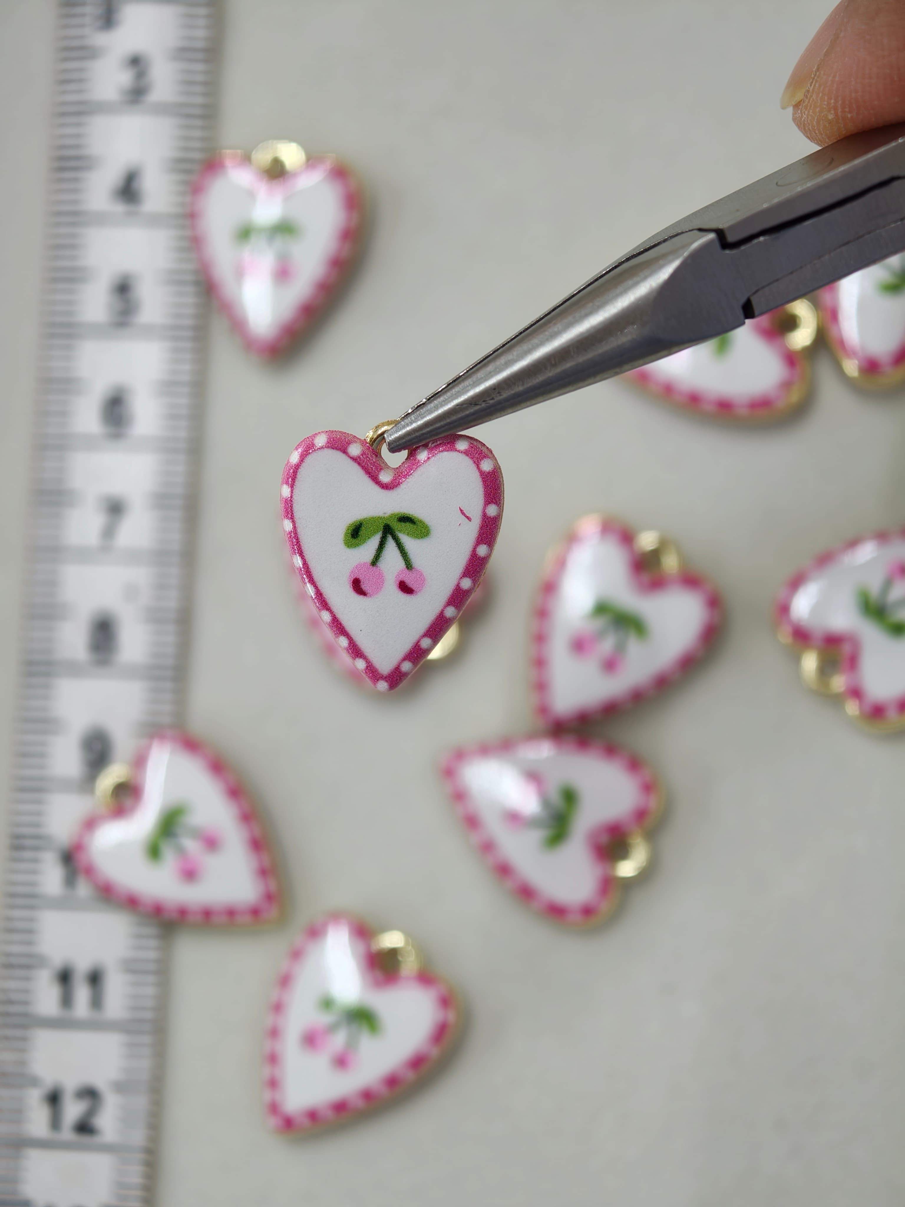 Two sided enamel cherry heart 