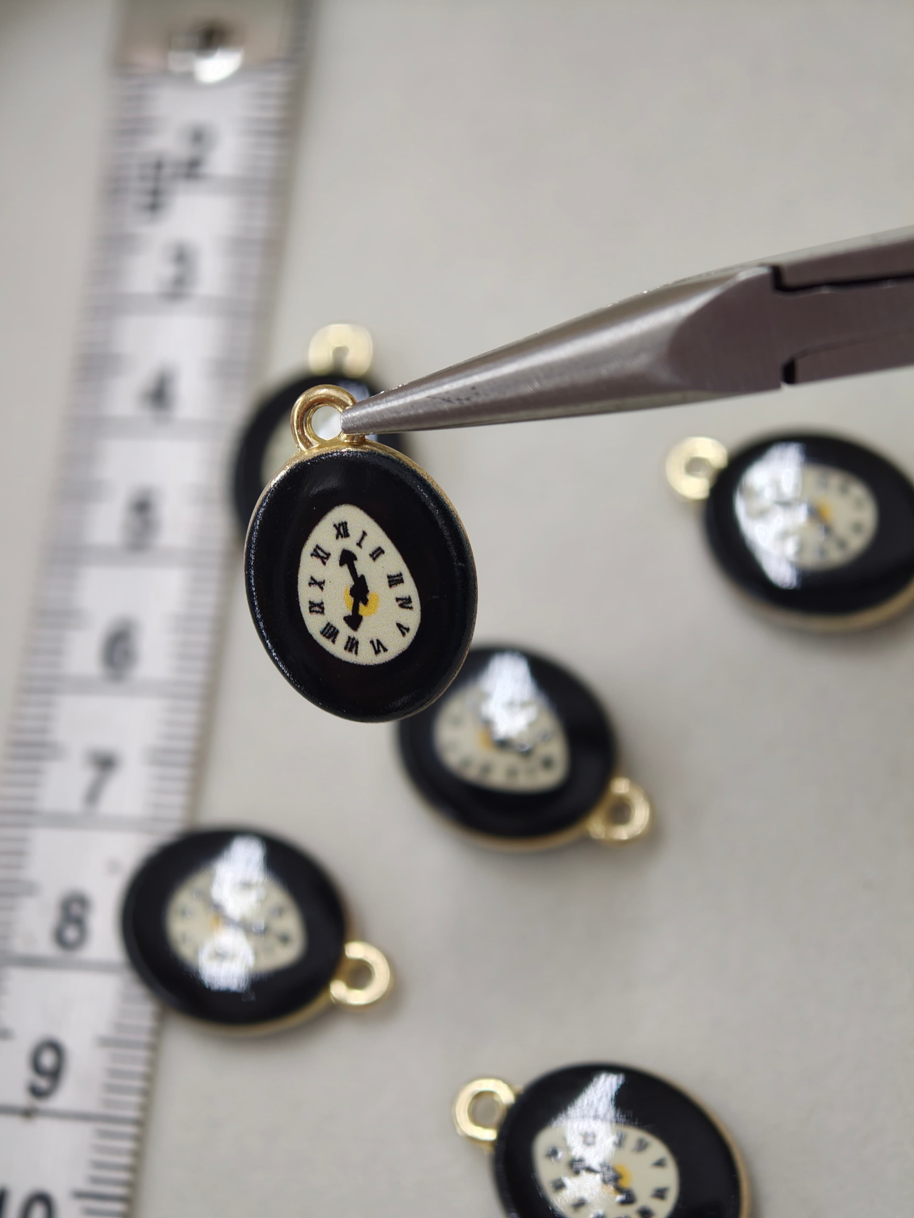 Two sided enamel clock charm 